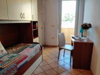 Posteľ alebo postele v izbe v ubytovaní Your home in Bonaria