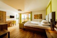 A bed or beds in a room at Der Almblick