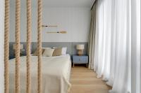 Posteľ alebo postele v izbe v ubytovaní Comfort Apartments Granaria