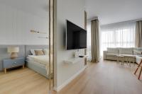 Posteľ alebo postele v izbe v ubytovaní Comfort Apartments Granaria