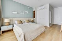 Posteľ alebo postele v izbe v ubytovaní Comfort Apartments Granaria