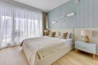 Posteľ alebo postele v izbe v ubytovaní Comfort Apartments Granaria