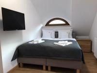 Postel nebo postele na pokoji v ubytování Apartamenty, Boutique Rooms Villa 82, MIEJSCE PRKINGOWE