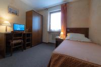 Posteľ alebo postele v izbe v ubytovaní Hotel Beau Sejour Pré-Saint-Didier