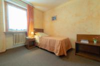 Posteľ alebo postele v izbe v ubytovaní Hotel Beau Sejour Pré-Saint-Didier