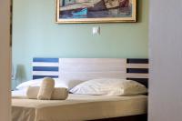 Posteľ alebo postele v izbe v ubytovaní Irini Apartments
