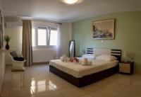 Posteľ alebo postele v izbe v ubytovaní Irini Apartments