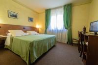 Posteľ alebo postele v izbe v ubytovaní Hotel Beau Sejour Pré-Saint-Didier