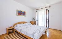 Posteľ alebo postele v izbe v ubytovaní Apartman Jadranovo