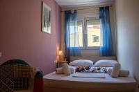 Posteľ alebo postele v izbe v ubytovaní Irini Apartments