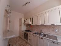 A kitchen or kitchenette at APPARTAMENTO CASA MARCO