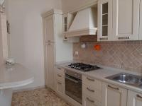 A kitchen or kitchenette at APPARTAMENTO CASA MARCO