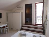 Posteľ alebo postele v izbe v ubytovaní Apartmani Pilon
