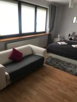Posteľ alebo postele v izbe v ubytovaní APARTAMENT Zakątek Wrocławia