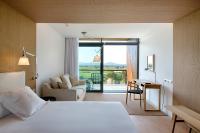 Posteľ alebo postele v izbe v ubytovaní Empordà Golf Resort