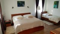 Posteľ alebo postele v izbe v ubytovaní B&B Plitvice Lakes Villa Mija