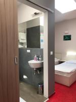 Posteľ alebo postele v izbe v ubytovaní Hostel Promenada