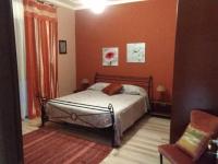A bed or beds in a room at B&B "Al Calopinace"