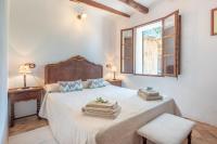 Postel nebo postele na pokoji v ubytování Villa Cami de la Mar