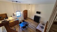 TV a/nebo společenská místnost v ubytování Apartmány Turold Mikulov