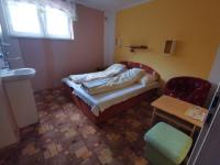 A bed or beds in a room at Prenájom v súkromí Krompachy
