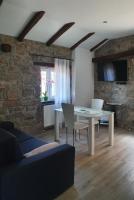 Televízia a/alebo spoločenská miestnosť v ubytovaní Holiday Home Demark
