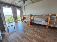 Posteľ alebo postele v izbe v ubytovaní Sea Hostel