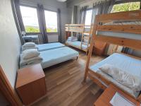 Posteľ alebo postele v izbe v ubytovaní Sea Hostel