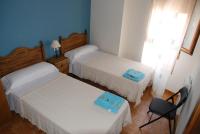 Cama o camas de una habitación en Apartamentos Rurales San Juan
