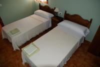 Cama o camas de una habitación en Apartamentos Rurales San Juan