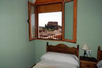 Cama o camas de una habitación en Apartamentos Rurales San Juan