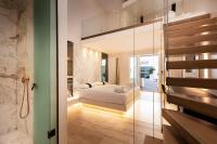 Posteľ alebo postele v izbe v ubytovaní Kahlua Boutique Hotel
