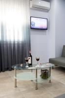Telewizja i/lub zestaw kina domowego w obiekcie Kaiafas Luxury Philoxenia