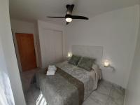 Postel nebo postele na pokoji v ubytování Appartement avec Solarium