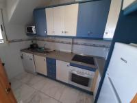 Kuchyň nebo kuchyňský kout v ubytování Appartement avec Solarium