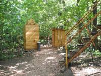 Zahrada ubytování Treehouse v Brdech