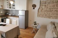Kuchyň nebo kuchyňský kout v ubytování Casa Porta Verde