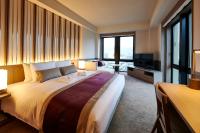THE GATE HOTEL京都高瀬川 by HULICにあるベッド