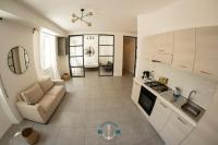 A kitchen or kitchenette at Ostia Holiday Lotito Loft