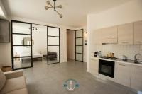 A kitchen or kitchenette at Ostia Holiday Lotito Loft