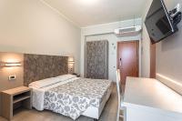 A bed or beds in a room at Hotel San Giorgio