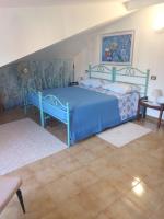 Posteľ alebo postele v izbe v ubytovaní Villa Cavaliere