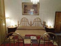 Posteľ alebo postele v izbe v ubytovaní Villa Cavaliere