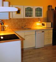 Kuchyňa alebo kuchynka v ubytovaní Apartamenty w Starym Kinie