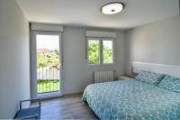 Postel nebo postele na pokoji v ubytování ¡Nuevo! Casa reformada, cómoda y con vistas al mar