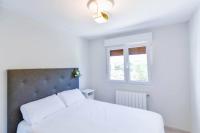 Postel nebo postele na pokoji v ubytování ¡Nuevo! Casa reformada, cómoda y con vistas al mar