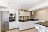 Kuchyň nebo kuchyňský kout v ubytování ¡Nuevo! Casa reformada, cómoda y con vistas al mar