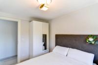 Postel nebo postele na pokoji v ubytování ¡Nuevo! Casa reformada, cómoda y con vistas al mar