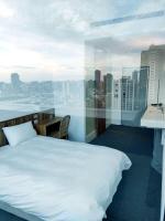 Star Hostel Taichung Parklaneにあるベッド
