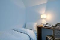 Star Hostel Taichung Parklaneにあるベッド